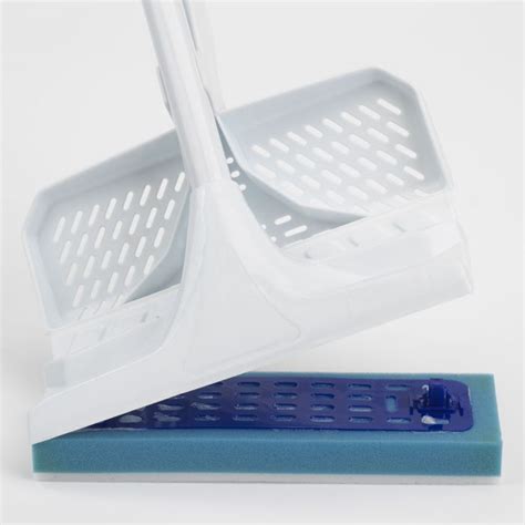 Cleaning hard-to-reach areas with the magic eraser squeeze mop